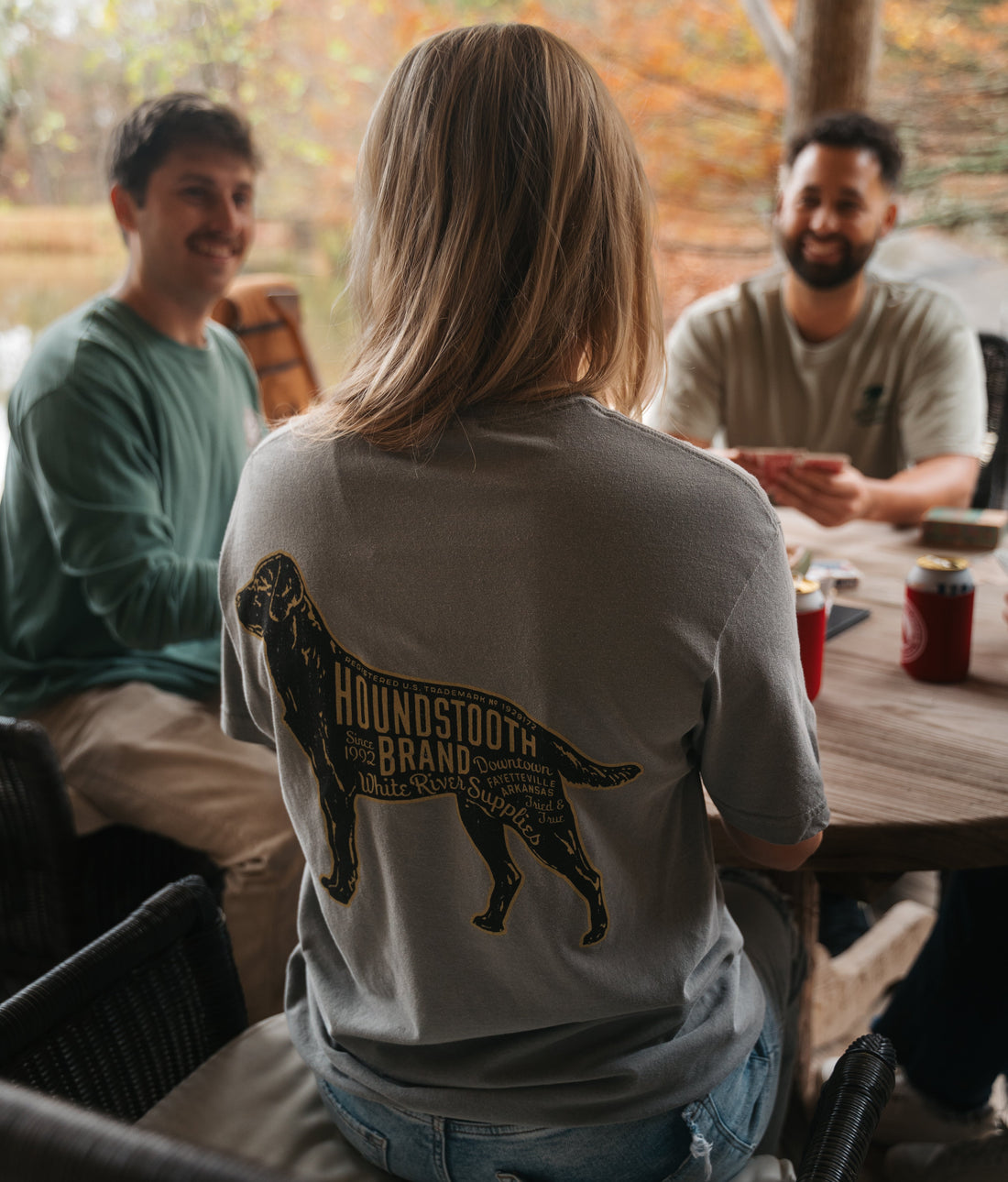 A grey shirt with a picture of a labrador on it with text that says Houndstooth Brand.