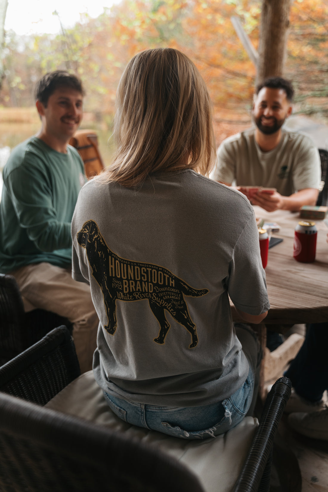 A grey shirt with a picture of a labrador on it with text that says Houndstooth Brand.